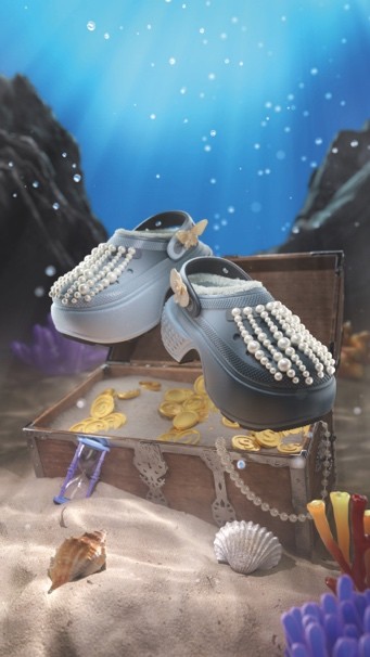 A pair of shoes on a table Description automatically generated with low confidence